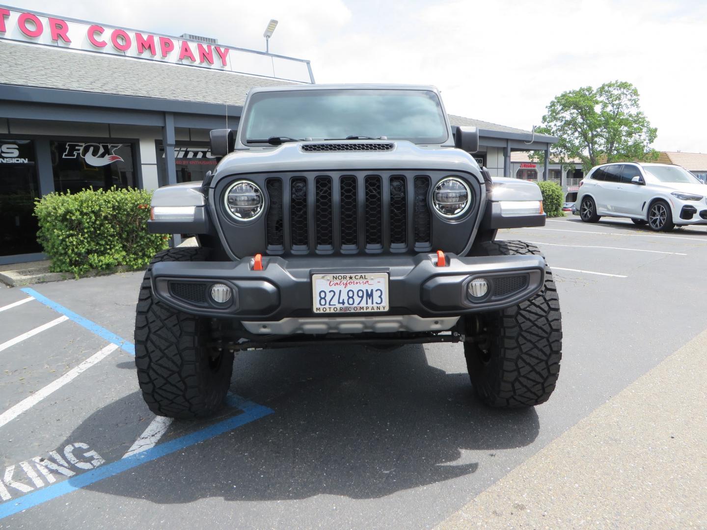 2021 Sting Grey /BLACK Jeep Gladiator Gladiator Mojave (1C6JJTEG4ML) with an 3.6L V6 engine, automatic transmission, located at 2630 Grass Valley Highway, Auburn, CA, 95603, (530) 508-5100, 38.937893, -121.095482 - Mojave Galdiator featuring a Readylift 4" suspension system, 37" Nitto Ridge Grappler tires, 17" Fuel Ammo wheels, Rugged Ridge bed cover, and window tint. - Photo#1